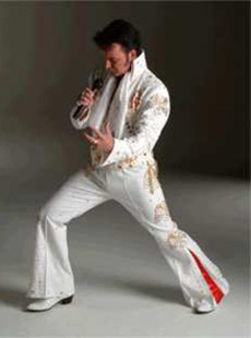 Mike as Elvis in white costume